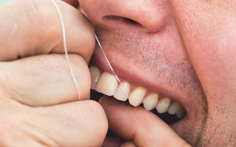 برای استفاده از نخ دندان چه مراحلی را انجام دهیم؟